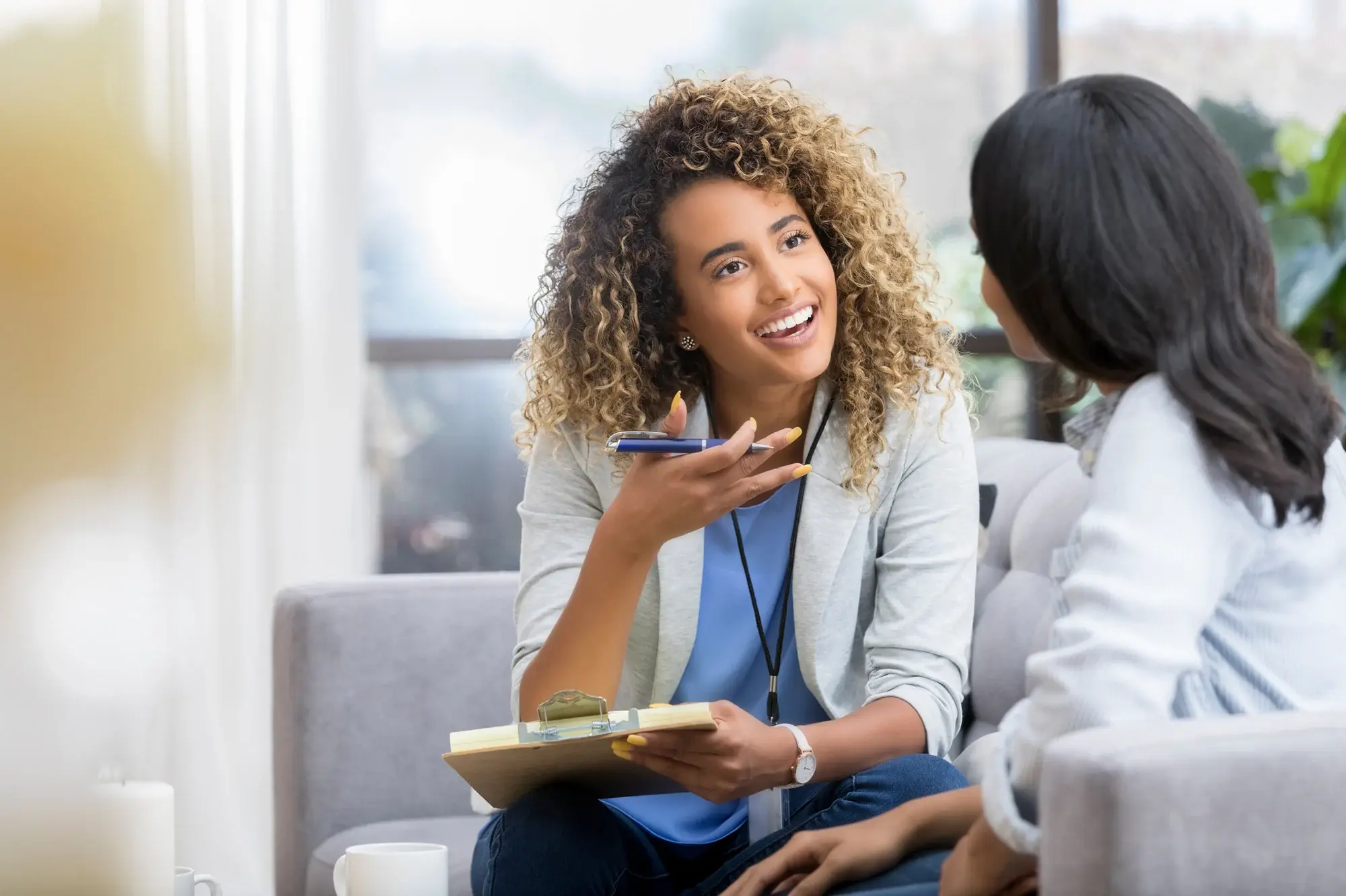 A females doctor talks to a patient in a medical office. 